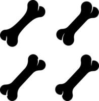 Four black dog bone silhouettes on a white background vector