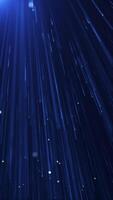 Digital data stream tech background with fast moving blue fiber optic light data nodes and particles. This vertical technology background is full HD and a seamless loop. video