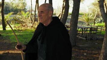 Bald Adventurer Walking Through the Forest Trees video