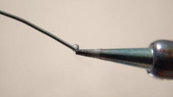 Heating the Soldering Iron. A detailed view of a soldering, showing the precision and skill involved in creating strong electrical connections. video