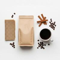 Coffee Still Life Kraft Bag, Cup, Beans, and Cinnamon on White Background photo