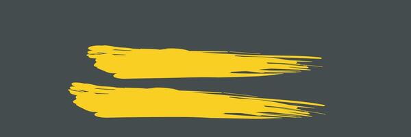 Two yellow paint strokes on a gray background vector