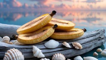 Sliced Bananas Resting on Driftwood with Seashells Against a Beach Backdrop photo