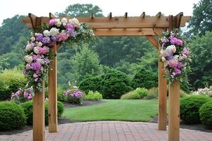Wooden Wedding Arbor Decorated with Blooming Hydrangeas and Roses. A romantic outdoor ceremony setting with lush greenery. photo