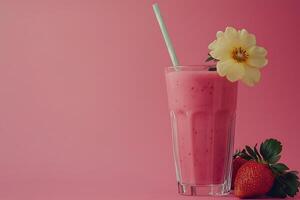 Refreshing Strawberry Smoothie with Flower Garnish A Pink Delight. photo