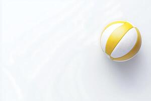 Close up of a Yellow and White Volleyball on a White Background. Perfect for Sports-Related Designs. photo
