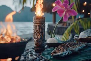 Grilled Fish Dinner on Tropical Beach at Sunset with Tiki Torch. photo