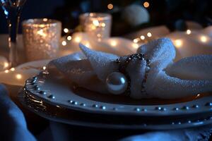 Elegant Table Setting with Pearl Napkin Ring and Fairy Lights. A close-up image perfect for holiday or special occasion themes. photo