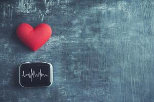 Heart Health Monitoring Red Heart and Heartbeat Display on Smartwatch. photo