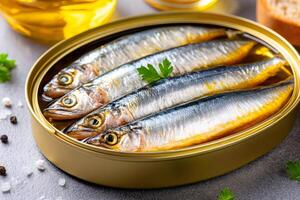 Sprats preserved in oil with parsley in a can photo