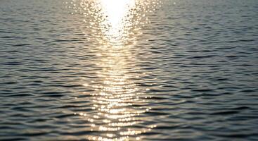 The sun is shining over the water photo