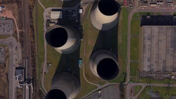 Drone shot of thermal power station turbines and cooling towers England Nottingham video