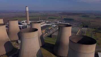 Thermal energy facility with turbines and cooling towers aerial drone Nottingham video