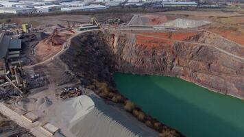Extraction site in Leicester with machinery and storage from drone angle video