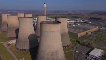 Aerial view of energy plant cooling towers and turbine units Nottingham UK video