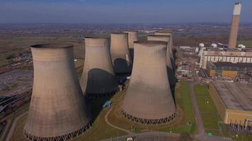 Drone footage of electricity generation power plant with cooling towers Nottingham video