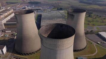 Industrial energy plant with large cooling towers and turbines drone view Nottingham video