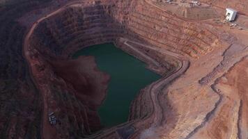 Aerial drone footage of open quarry mine with coal and iron ore in Leicester video