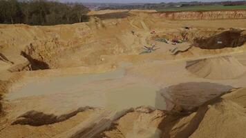 coal mining operations and gravel pits with equipment England video