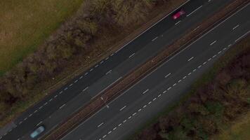 Roadway infrastructure and transportation movement filmed from drone above England video