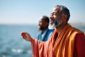 Charismatic man in colorful robes inviting fishermen to follow by a sparkling lake photo