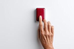 Emergency call alarm device activated by older adult for safety and support in daily life photo