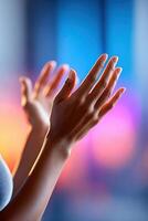 Passionate hand gestures convey powerful emotions during an expressive speech in vibrant lighting photo
