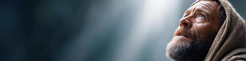 Saul stands transformed in a moment of divine inspiration with light in his eyes and hope in his heart photo