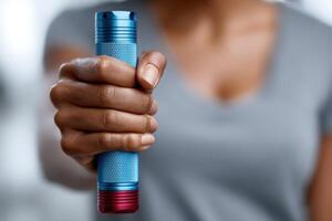 Close-up of hands gripping a colorful self-defense tool, showcasing confidence and preparedness for personal safety photo