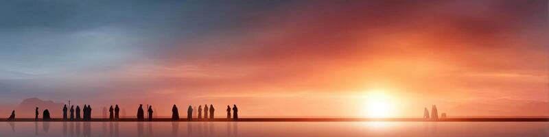Gathering of unity and promise under a vibrant sky at sunset photo