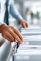 Efficiently organizing files with modern filing systems and clear labels in a professional workspace photo