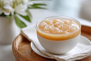 Enjoying a refreshing bowl of mote con huesillo on a warm afternoon photo