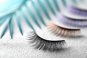 Discover a vibrant collection of false eyelashes showcased against a lively background for beauty enthusiasts photo