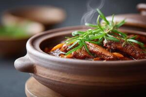 Hearty caterpillar stew simmering in an earthenware pot with fresh herbs and vibrant vegetables photo