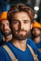 Proud factory workers showcasing teamwork and dedication in a production environment photo