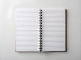 Blank Spiral Notebook on White Background photo