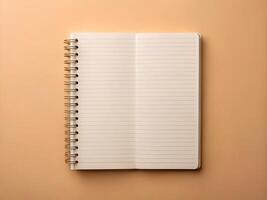 notebook on beige background photo