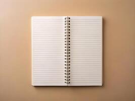 blank notebook beige background photo