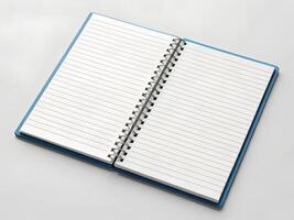 Open Blue Notebook with Dotted Pages on White Background photo