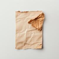 Textured brown paper sheet on white background photo