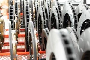 Brake rotors and pads in a warehouse photo