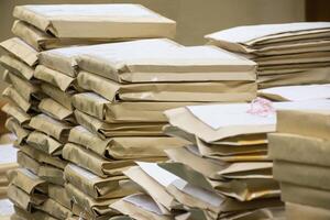 A pile of brown envelopes photo