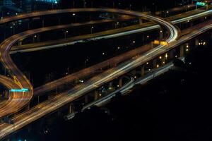 An aerial view of a highway at night photo