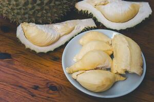 A white plate with a durian on it photo