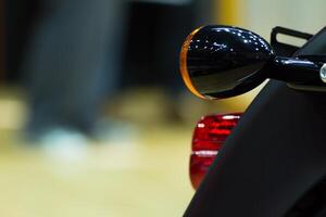 A motorcycle with a rear view mirror photo
