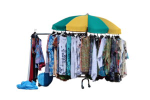 Clothes rack displaying colorful summer fashion at an outdoor market with transparent background png