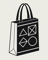 Black tote bag with geometric shapes on beige background vector