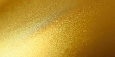 This image displays a textured gold background, showcasing its rich and luxurious appearance. photo