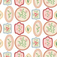 Pattern of flower-embroidered frames. Various frames with floral motifs. Seamless colored flat texture. Vintage items with flower embroidery inside a cutout frame. Handmade. Frames on white background vector