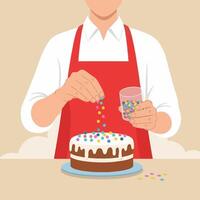 Person Decorating Chocolate Cake with Colorful Sprinkles in Kitchen vector